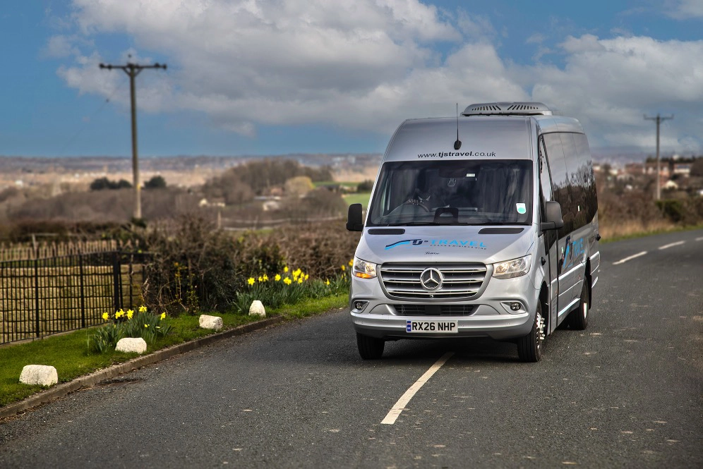 RX26 NHP Silver Minibus Hire on a Country Road